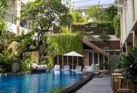 Hotel pool and tropical surroundings